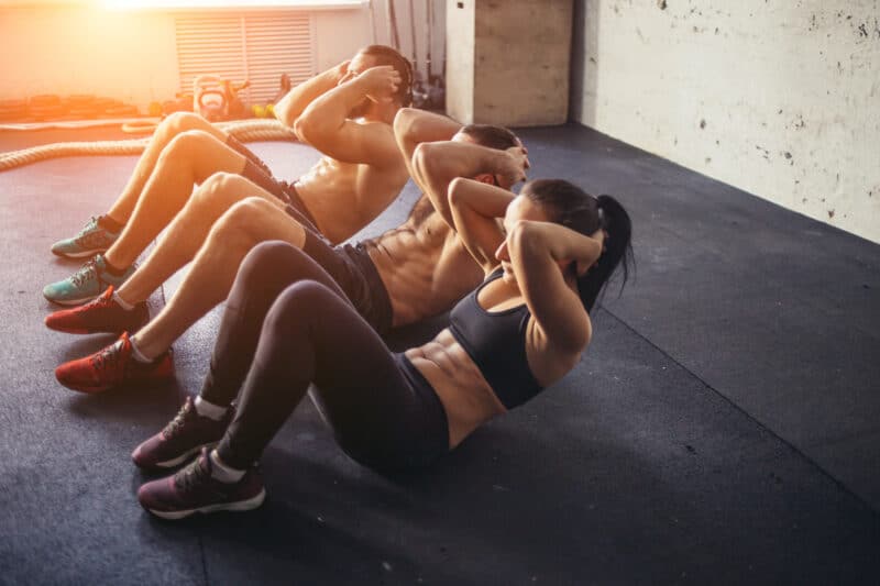 Group of People Training Abs